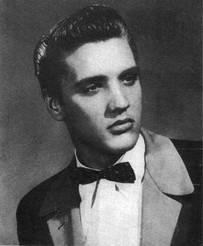 Elis Presley in a Sun Records promotional photograph, 1954. Wikimedia