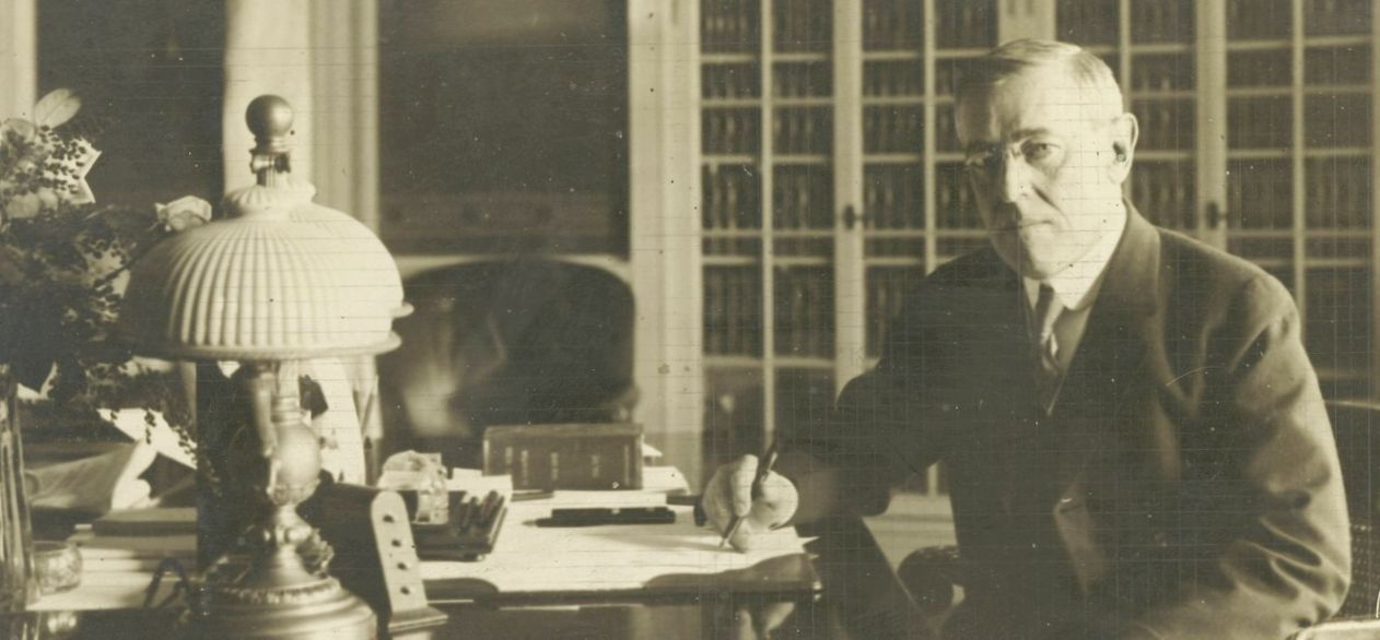 Wilson at his desk