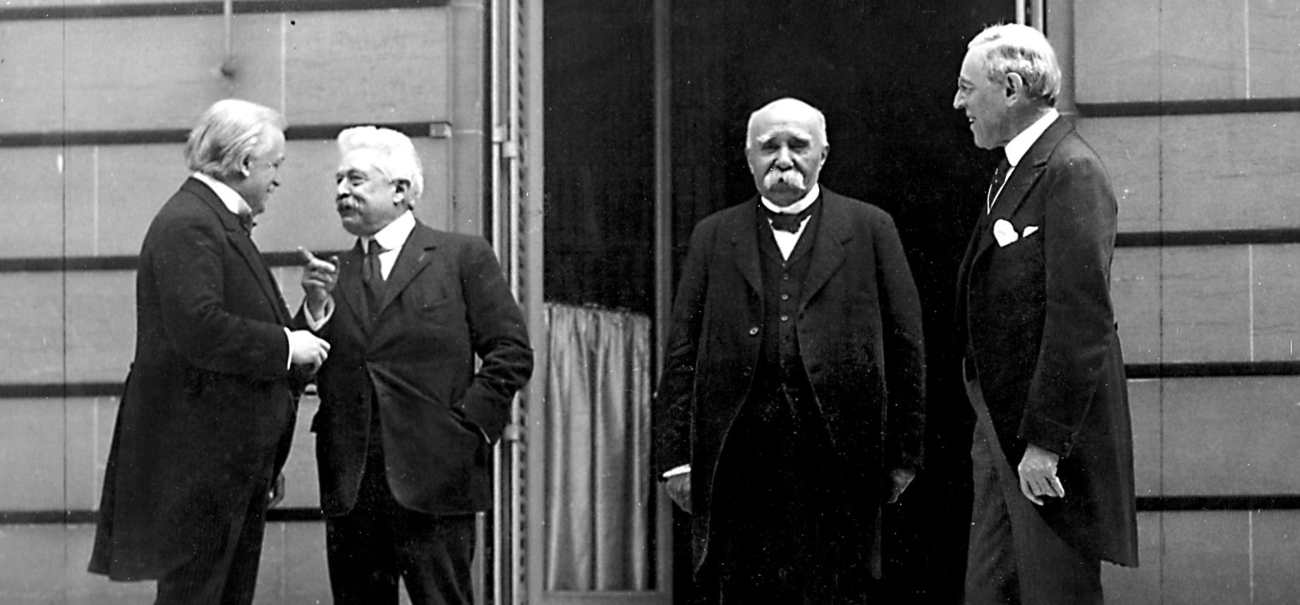 Wilson stands near Clemenceau during the peace talks at Versailles, 1919. US Army Signal Corps