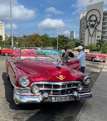 An antique Cadillac shines in the Cuban sun.